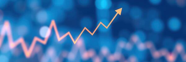 Rising trend line indicating growth in data analytics performance over a blue background with blurred lights photo