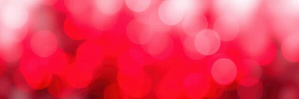 Vibrant red bokeh lights create a festive atmosphere during the evening celebration photo