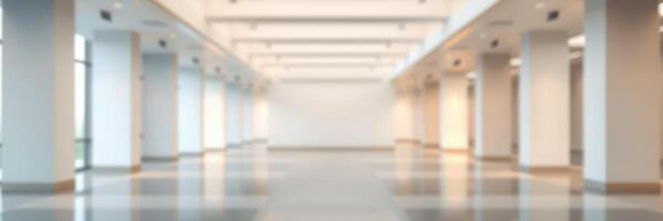 Spacious interior hallway features bright lighting and polished floors in a modern building photo