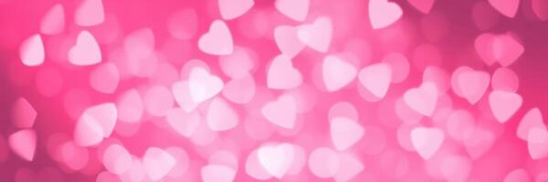 Colorful heart-shaped bokeh lights create a romantic atmosphere for celebrations and special occasions photo