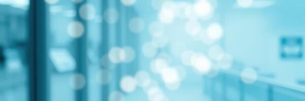 Soft bokeh effects create an abstract background in a modern building lobby during daylight photo