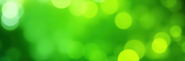 Abstract green bokeh background creating a vibrant atmosphere of nature and light during a sunny day photo