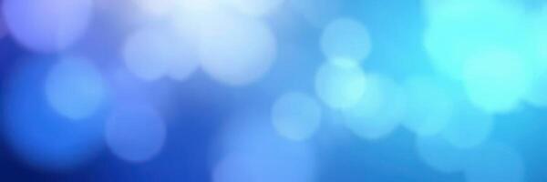 Soft blue and purple bokeh lights create an ethereal atmosphere for creative backgrounds and designs photo