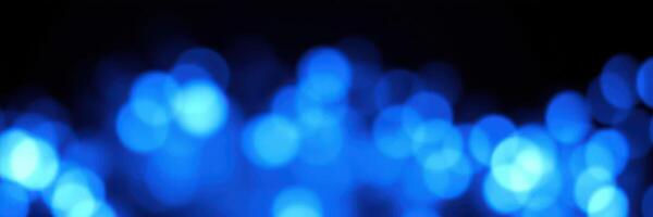 Beautiful blue bokeh lights create a dreamy atmosphere for evening celebrations and events in various settings photo