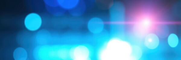 Blue and purple light abstract background creating a vibrant atmosphere for events or performances photo