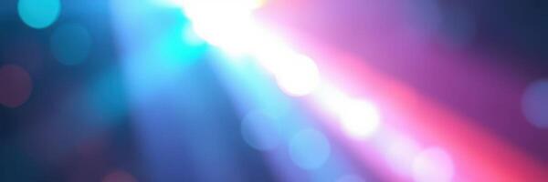 Colorful light beams create a vibrant atmosphere at a nighttime celebration in an urban setting photo
