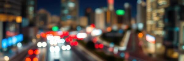 Nighttime urban landscape with blurred traffic lights and illuminated city skyline photo