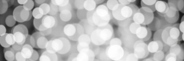 Soft, shimmering bokeh lights create a dreamy atmosphere in a cozy space during evening hours photo