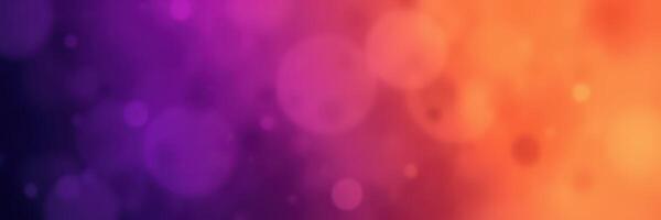 Vibrant colorful bokeh background featuring shades of purple and orange in a soft dreamy atmosphere photo