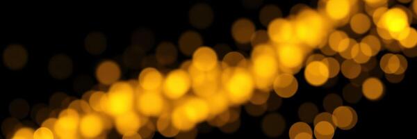 Beautiful golden bokeh lights creating a mesmerizing atmosphere in a warm setting at night photo