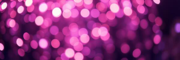 Vibrant pink bokeh lights create a festive atmosphere at a nighttime celebration photo
