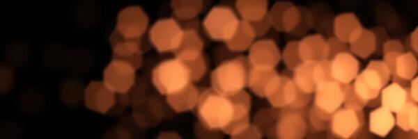 Warm amber lights create a cozy atmosphere during an evening gathering at a local cafe photo