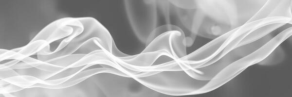 White smoke swirling gracefully against a gray background creating an ethereal atmosphere photo