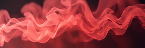 Swirling red smoke creates a captivating visual effect against a dark background photo