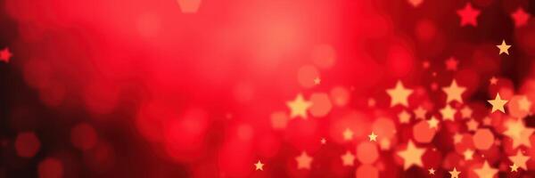 Decorative red background with shimmering stars creating a festive atmosphere photo
