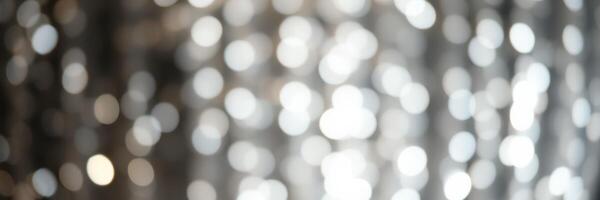 Sparkling bokeh lights create a magical atmosphere for a festive celebration in an indoor venue during the evening hours photo