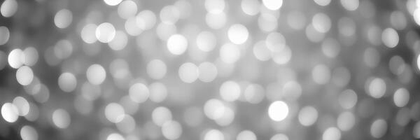 Shimmering bokeh lights create a mesmerizing atmosphere at a festive night celebration photo