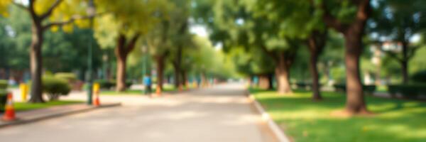 Lush green park path with cyclists enjoying a sunny afternoon in a suburban area photo