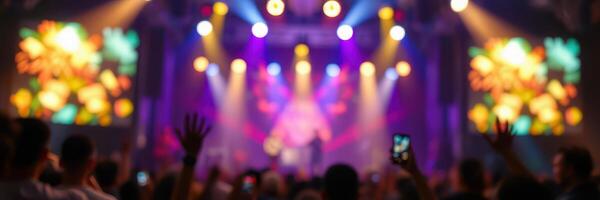 Exciting concert atmosphere with vibrant lights and engaged audience in a lively venue photo