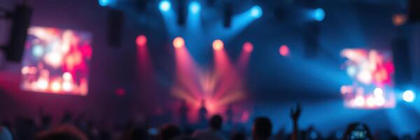 Lights and energy fill the venue during a dynamic live music performance at night photo