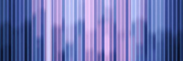 Colorful vertical stripes create a vibrant abstract pattern in shades of purple and blue during a quiet evening photo