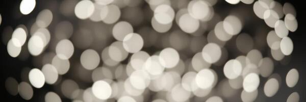 Soft blurred bokeh lights create a dreamy atmosphere for a cozy indoor gathering or festive celebration photo