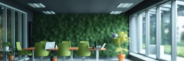 Modern office space with green accents and natural light during a sunny day photo