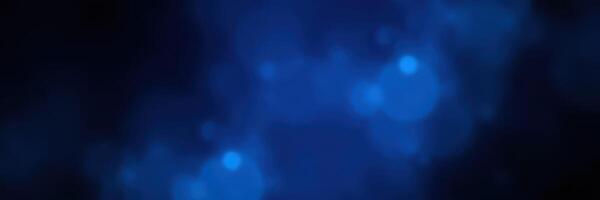 Vibrant blue abstract background with soft glowing elements and a dreamy atmosphere near twilight photo
