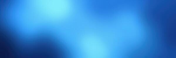 Soft blue abstract background with light variations creating a tranquil atmosphere suitable for design projects photo