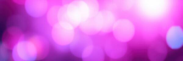 Bright and colorful abstract bokeh lights create a vibrant atmosphere during a festive celebration in an indoor event space photo
