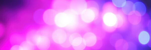 Colorful bokeh lights create a vibrant atmosphere at an evening celebration photo