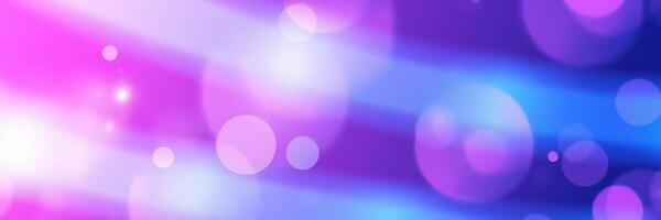 Colorful bokeh background with vibrant purple and blue hues creating an abstract visual effect for artistic projects photo