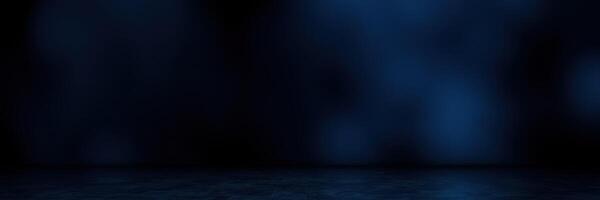 Dark blue abstract background with subtle light effects creating a tranquil atmosphere for design projects photo