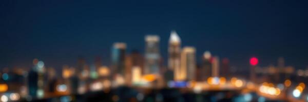 Vibrant city skyline illuminated at night showcasing urban life and architecture with glowing lights photo