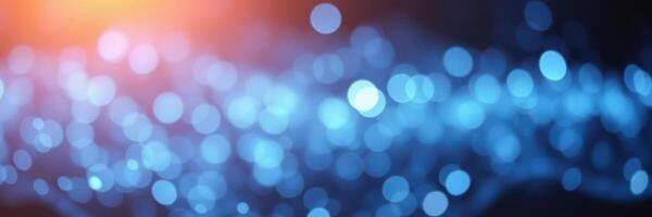 Beautiful blue and orange bokeh lights create an abstract background suitable for artistic or celebratory themes photo
