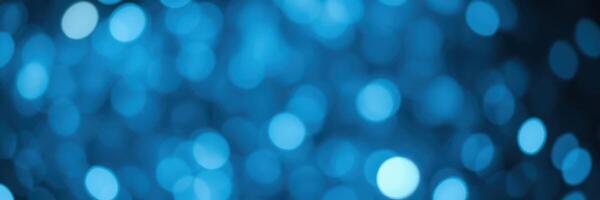 Vibrant blue bokeh lights create a serene atmosphere in an evening setting ideal for celebrations and relaxation photo