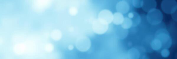 Soft blue bokeh background creates a calming atmosphere perfect for design or art projects photo
