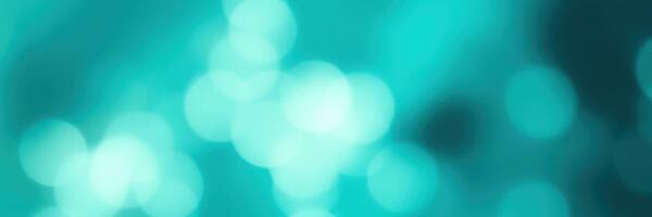 Blue and green bokeh lights create a calming atmosphere at a serene evening gathering near the lake photo
