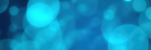 Beautiful blue abstract background with bright bokeh circles creating a tranquil atmosphere for relaxation or creative inspiration photo