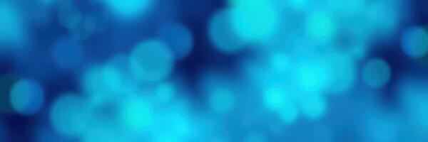 Vivid blue bokeh background creates a serene atmosphere perfect for creative projects and digital design purposes photo