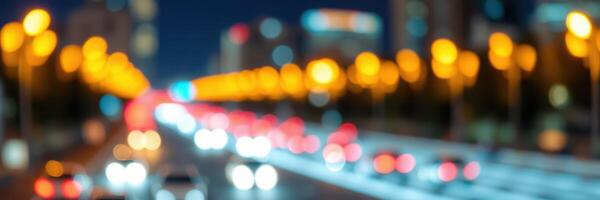 City street illuminated at night with blurred lights and moving cars creating a dynamic urban atmosphere photo