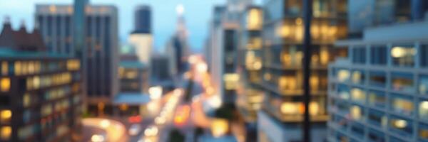 City skyline during twilight with blurred lights from tall buildings and streets photo