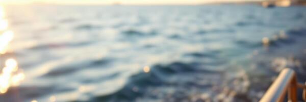 Sunset view over the calm waters from a boat in a coastal location during a warm evening photo