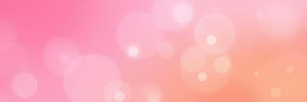 Colorful bokeh background creates a dreamy atmosphere with soft pink and orange hues photo
