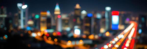 City skyline illuminated at night with blurred lights and vibrant colors creating a lively urban atmosphere photo