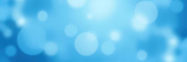 Beautiful blue background with soft bokeh effect creating a serene atmosphere in a bright setting photo