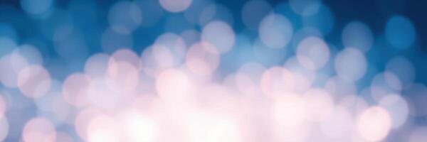 Soft bokeh lights create a dreamy atmosphere in a tranquil blue setting during a serene evening photo