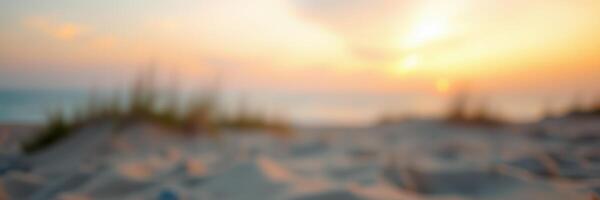 Beautiful sunset over the beach with soft clouds and calm waters creating a serene atmosphere at dusk photo