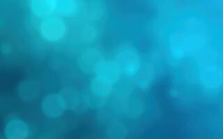 Soft blue bokeh background creates a serene atmosphere for creative projects and digital designs photo