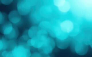 Beautiful teal bokeh background creating a dreamy ambiance suitable for various artistic uses and projects photo